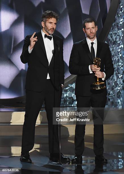 Writer/producers David Benioff and D.B. Weiss accept the award for Outstanding Writing for a Drama Series for 'Game of Thrones' episode 'Battle of...