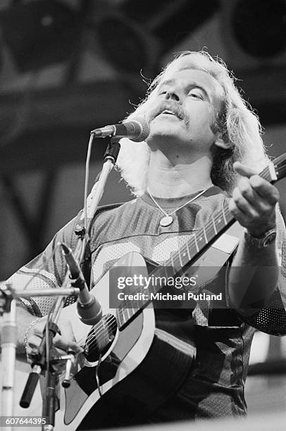 American singersongwriter Jimmy Buffett performing on stage, USA, 3rd August 1977.