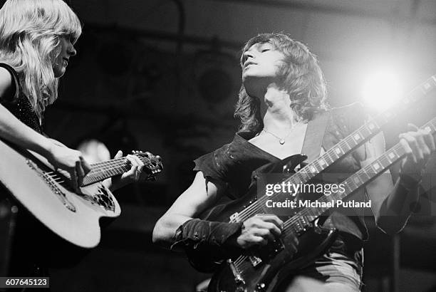 Singer-songwriters and guitarists Nancy Wilson and her sister Ann Wilson, performing with American hard rock band Heart, at Portland Memorial...