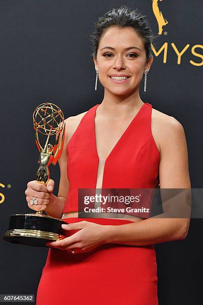Actress Tatiana Maslany, winner of the Outstanding Lead Actress in a Drama Series award for 'Orphan Black,' poses in the press room during the 68th...