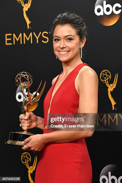 Actress Tatiana Maslany, winner of Best Actress in a Drama Series for "Orphan Black", poses in the press room during the 68th Annual Primetime Emmy...