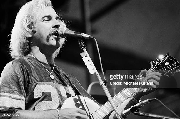 American singersongwriter Jimmy Buffett performing on stage, USA, 3rd August 1977.