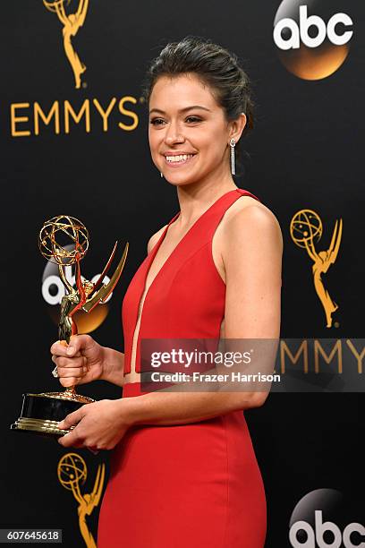 Actress Tatiana Maslany, winner of Best Actress in a Drama Series for "Orphan Black", poses in the press room during the 68th Annual Primetime Emmy...