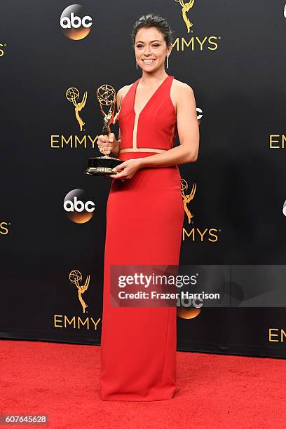 Actress Tatiana Maslany, winner of Best Actress in a Drama Series for "Orphan Black", poses in the press room during the 68th Annual Primetime Emmy...