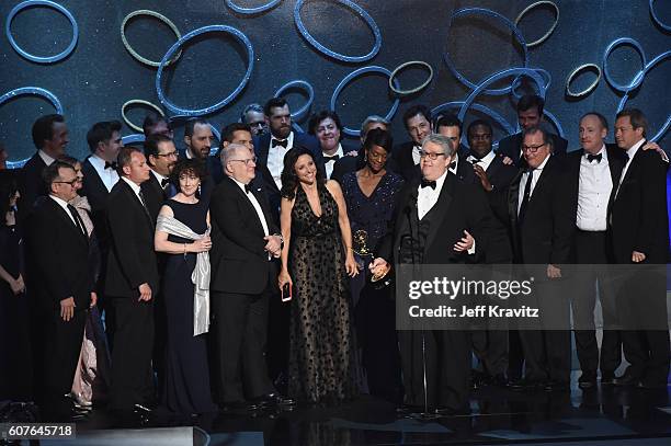 Actress Julia Louis-Dreyfus, producer David Mandel and production team accept the award for Outstanding Comedy Series for 'Veep' onstage during the...