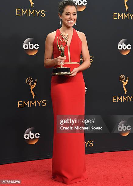 Actress Tatiana Maslany, winner of the award for Outstanding Lead Actress in a Drama Series for 'Orphan Black,' poses in the press room at the68th...