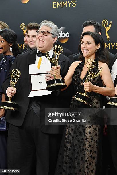 Producer David Mandel and actress Julia Louis-Dreyfus pose in the press room during the 68th Annual Primetime Emmy Awards at Microsoft Theater on...