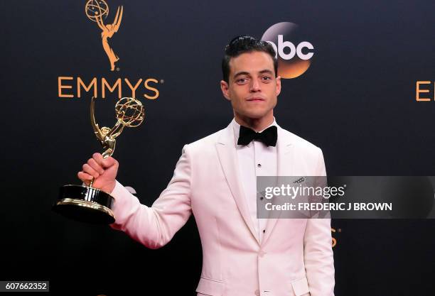 Actor Rami Malek poses with the Emmy for Outstanding Lead Actor in a Drama Series, in the press room during the 68th Emmy Awards on September 18,...