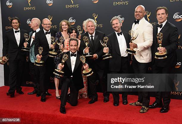 Writing-producing team for The People v. O. J. Simpson: American Crime Story, winners of Best Mini-Series or Movie, pose in the press room during...