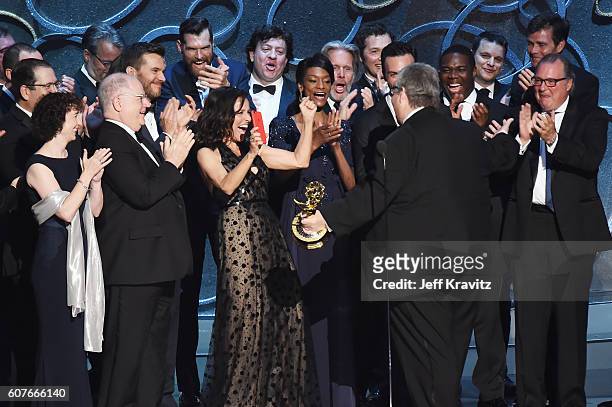 Actress Julia Louis-Dreyfus, producer David Mandel and production team accept the award for Outstanding Comedy Series for 'Veep' onstage during the...