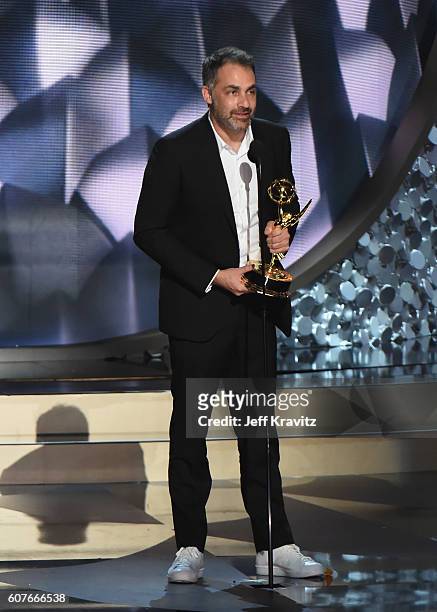 Director Miguel Sapochnik accepts Outstanding Directing for a Drama Series for 'Game of Thrones' episode 'Battle of the Bastards' onstage during the...