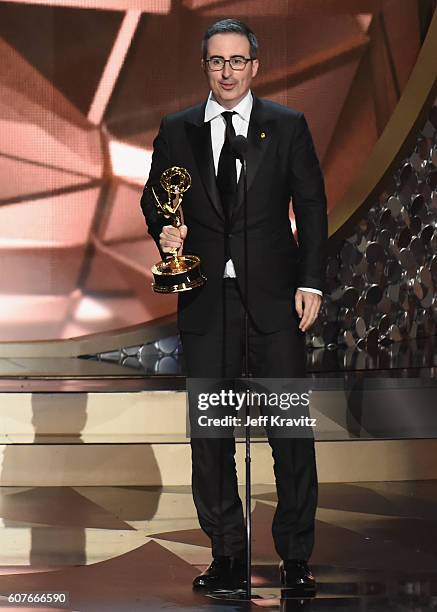 Personality John Oliver accepts Outstanding Variety Talk Series for 'Last Week Tonight with John Oliver' onstage during the 68th Annual Primetime...