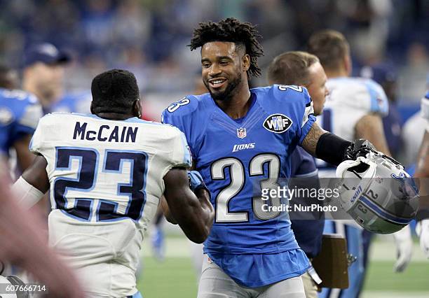 Detroit Lions cornerback Darius Slay greets Tennessee Titans defensive back Brice McCain after an NFL football game in Detroit, Michigan USA, on...