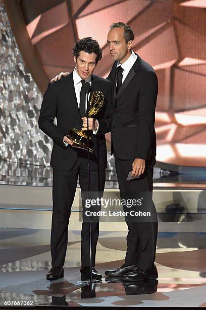 Directors Thomas Kail and Alex Rudzinski accept Outstanding Directing for a Variety Special for 'Grease: Live' onstage during the 68th Annual...