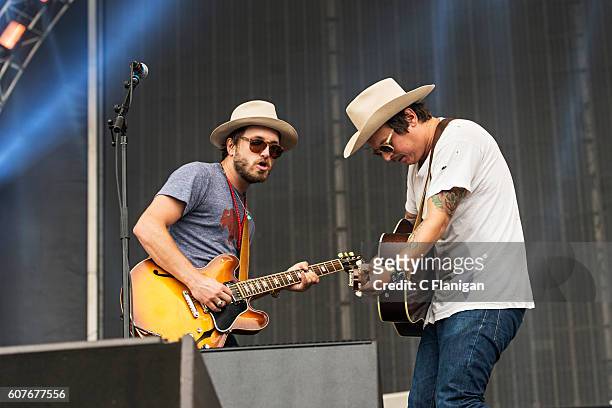 Taylor Burns and Ricky Young of The Wild Feathers perform on the Sunset Cliffs Stage during the 2016 KAABOO Del Mar at the Del Mar Fairgrounds on...