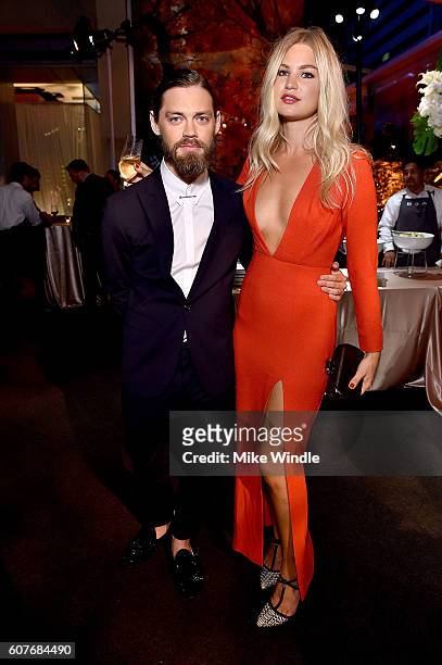 Actor Tom Payne and Jennifer Ackerman attend AMC Networks Emmy Party at BOA Steakhouse on September 18, 2016 in West Hollywood, California.