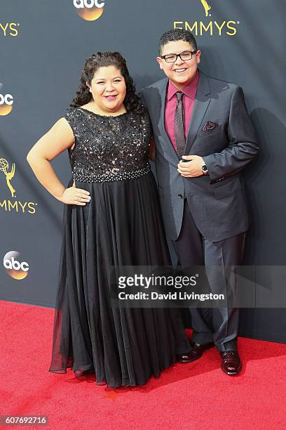 Actors Raini Rodriguez and Rico Rodriguez arrive at the 68th Annual Primetime Emmy Awards at the Microsoft Theater on September 18, 2016 in Los...