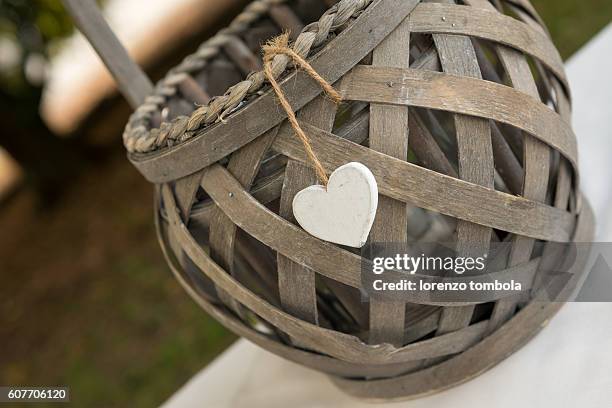 close-up of marriage basket whith heart - wicker heart stock pictures, royalty-free photos & images