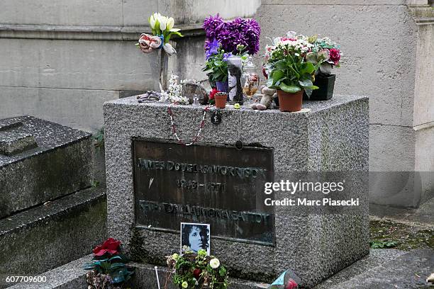 Close-up at Jim Morrison's grave at 'Pere Lachaise' cemetery on September 19, 2016 in Paris, France.