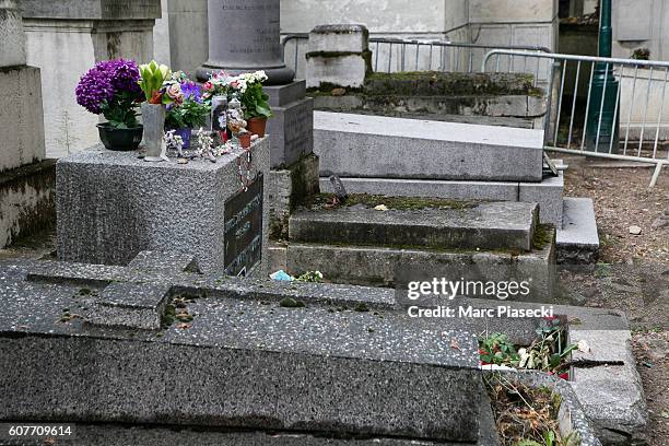 Close-up at Jim Morrison's grave at 'Pere Lachaise' cemetery on September 19, 2016 in Paris, France.