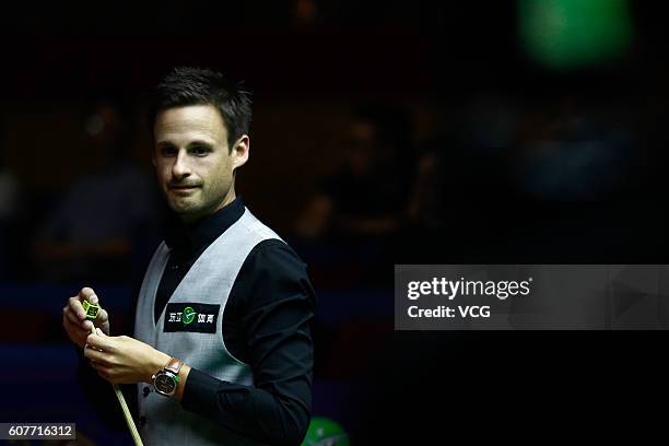 David Gilbert of England reacts in the match against Marco Fu of Hong Kong on day one of the Shanghai Masters 2016 at Shanghai Grand Stage on...