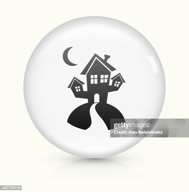 spooky halloween house icon on white round vector button - haunted house pattern stock illustrations