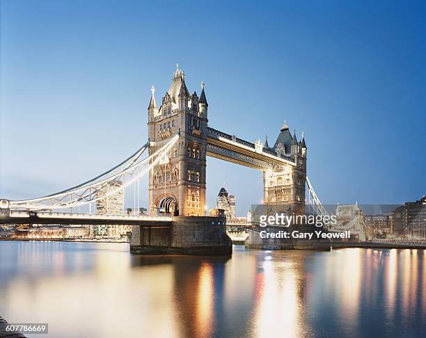 tower bridge and city of london at dusk - london landmark ストックフォトと画像