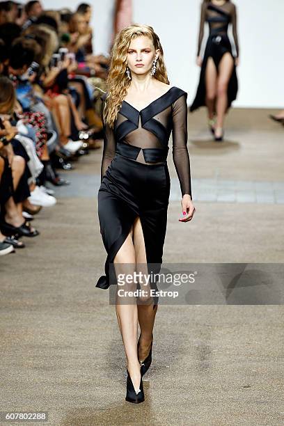 Model walks the runway at the Topshop Unique designed by Kate Phelan show during London Fashion Week Spring/Summer collections 2017 on September 18,...
