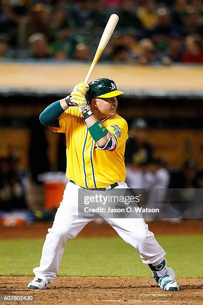 Billy Butler of the Oakland Athletics at bat against the Los Angeles Angels of Anaheim during the eighth inning at the Oakland Coliseum on September...