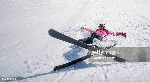 happy woman having fun skiing - happy skier stockfoto's en -beelden
