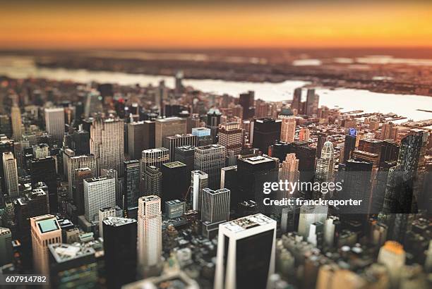manhattan skyline from an aerial view - tilt shift stock pictures, royalty-free photos & images