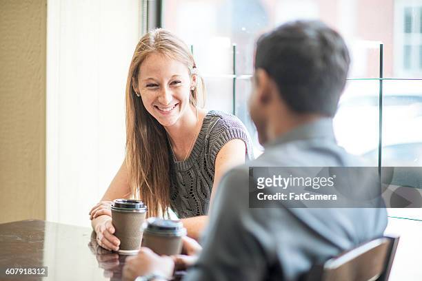 drinking coffee on a first date - blind date stock pictures, royalty-free photos & images