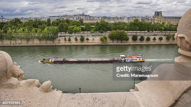 view of the seine river from a terrace - barge stock pictures, royalty-free photos & images