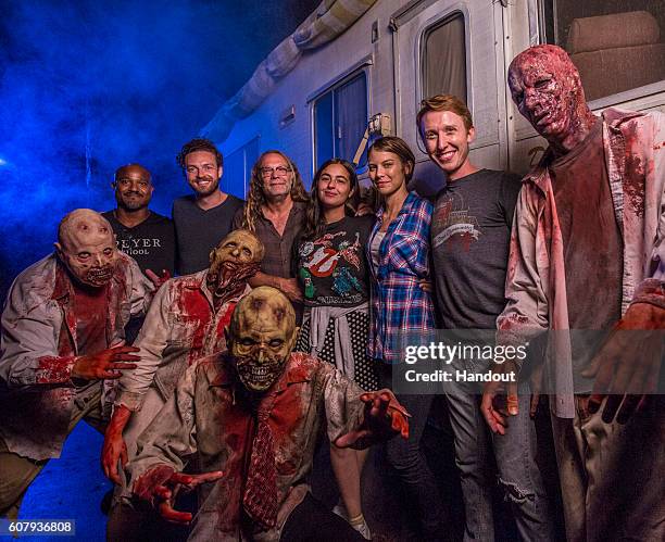 In this handout photo provided by Universal Orlando, cast members from AMC's "The Walking Dead" Lauren Cohan, Alanna Masterson, Seth Gilliam, Ross...