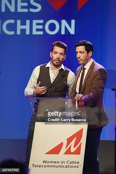 The Property Brothers Jonathan Scott and Drew Scott speak onstage during the WICT Leadership Conference Touchstones Luncheon at Marriot Marquis on...