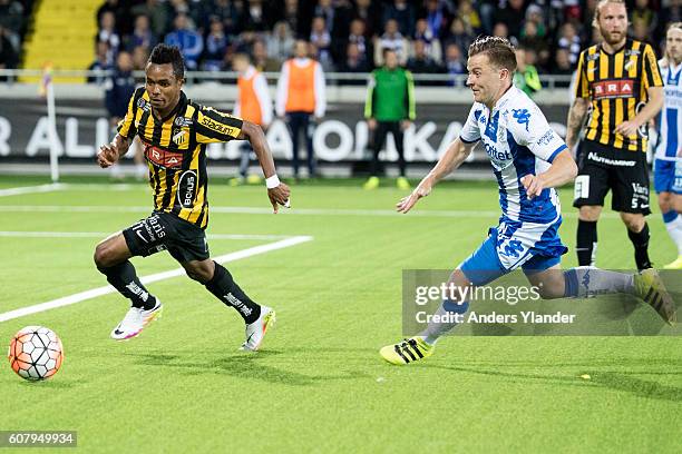 Nasiru Mohammed of BK Hacken and Scott Jamieson of IFK Goteborg fight for the ball during the Allsvenskan match between BK Hacken and IFK Goteborg at...