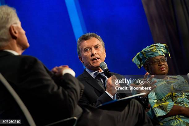 Mauricio Macri, president of Argentina, center, speaks in a panel discussion during the annual meeting of the Clinton Global Initiative in New York,...