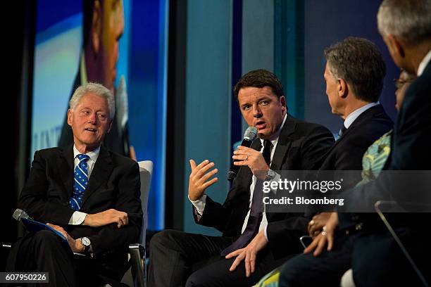 Matteo Renzi, prime minister of Italy, second left, speaks in a panel discussion during the annual meeting of the Clinton Global Initiative in New...