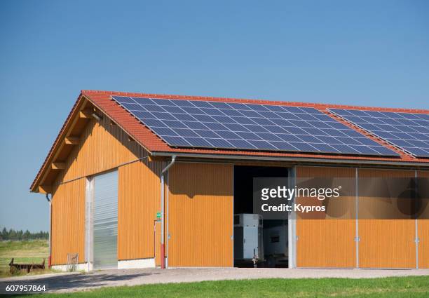 Europe, Germany, Bavaria, View Of Hay Barn With Solar panels, Solar Panel On Roof