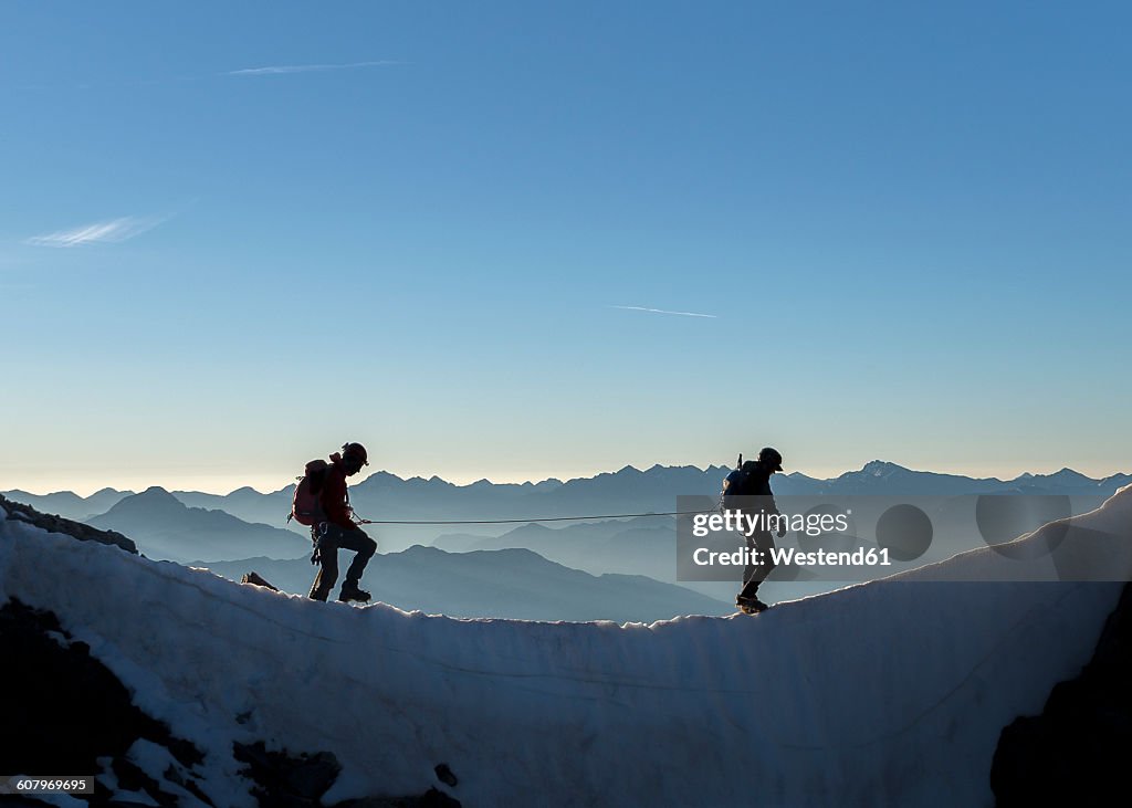 France, Ecrins Alps, two mountaineers at Dauphine