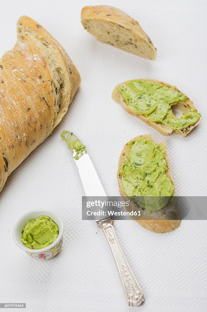 Slices of homemade ramson baguettes with ramson butter