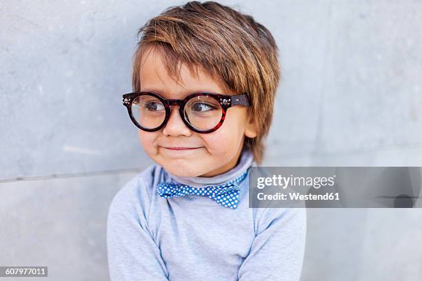 portrait of smiling little boy wearing oversized spectacles - kids eyeglasses stock pictures, royalty-free photos & images