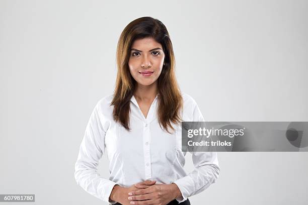 portrait of a young businesswoman - woman white shirt stock pictures, royalty-free photos & images