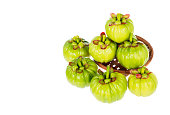 Garcinia cambogia fresh fruit, isolated on white. Fruit for diet