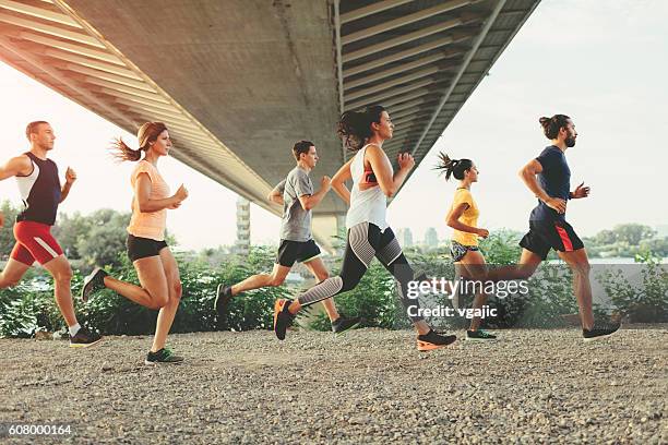 running team. - lid stockfoto's en -beelden