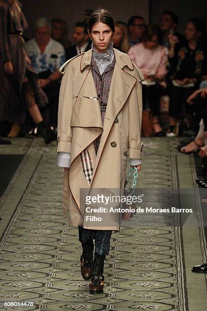 Model walks the runway at the Burberry show during London Fashion Week Spring/Summer collections 2016/2017 on September 19, 2016 in London, United...