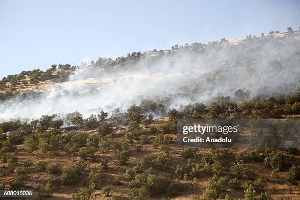 Smoke rises after Iranian army bombed the rural areas at the Sidekan town of Erbil, Iraq on September 19, 2016.