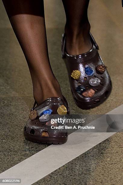 Model walks the runway at Christopher Kane runway show during London Fashion Week Spring/Summer collections 2017 on September 19, 2016 in London,...