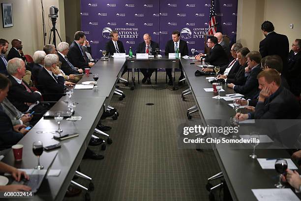 Sen. Rand Paul , Center for the National Interest Vice Chairman Dov Zakheim and Sen. Chris Murphy sit at the head of the table to discuss legislation...