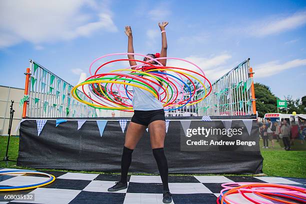 General view of a dancer with hula hoops during OnRoundhay Festival 2016 on September 17, 2016 in Leeds, England.